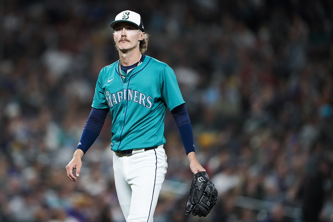 Seattle Mariners starting pitcher Bryce Miller walks to the dugout after facing the Minnesota Twins during the fourth inning of a baseball game Saturday, June 29, 2024, in Seattle.