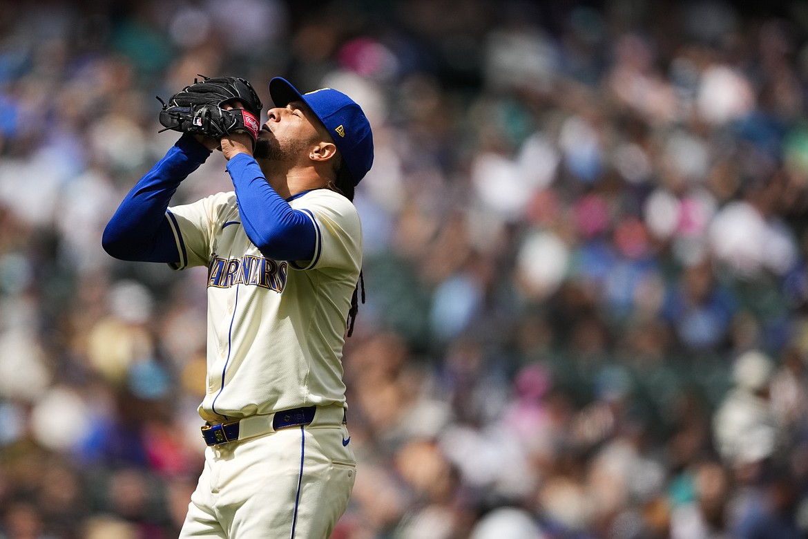 Seattle Mariners starting pitcher Luis Castillo walks off the field after pitching through the fourth inning of a baseball game Sunday, June 30, 2024, in Seattle.