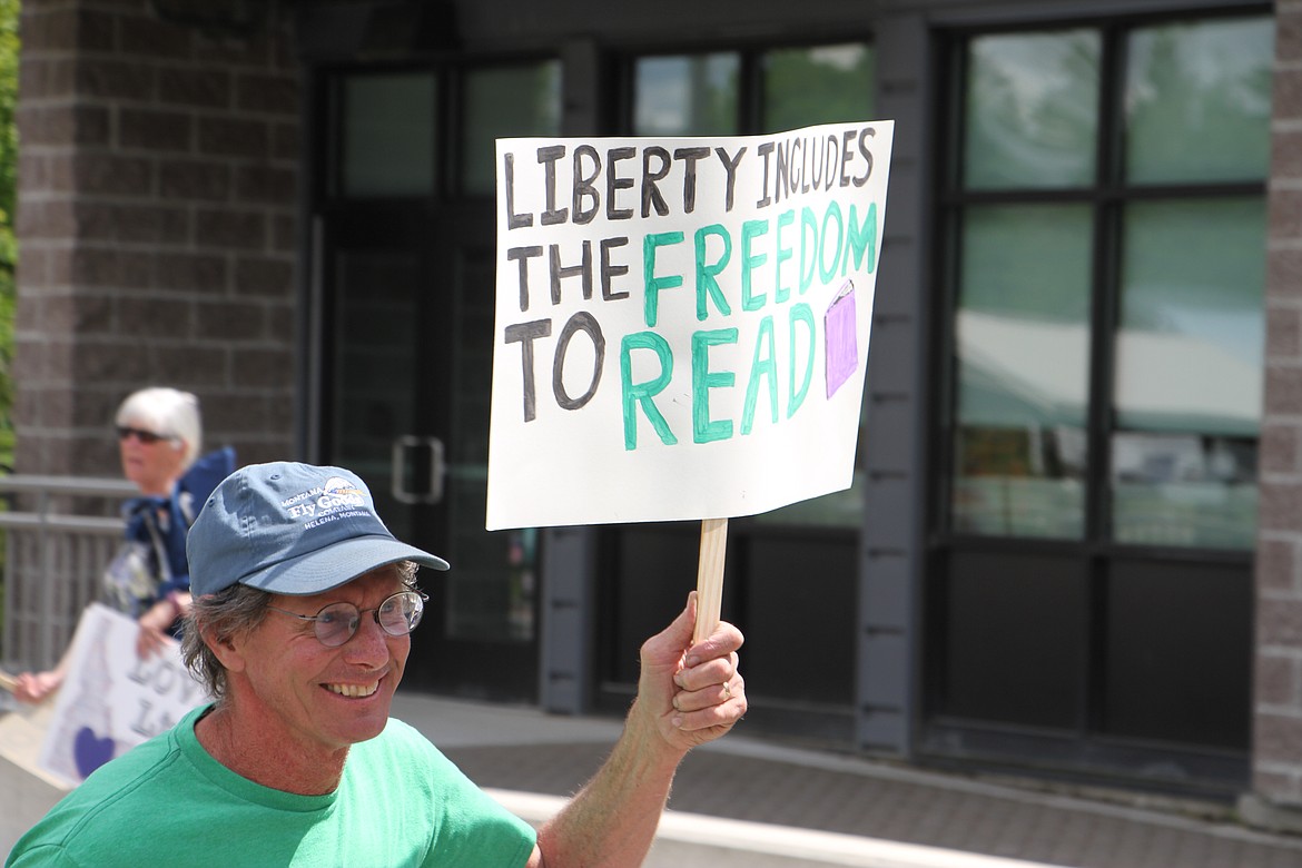 Demonstrators gathered outside Sandpoint's public library on Monday, July 1.