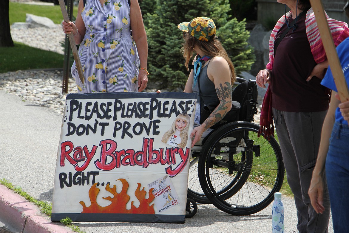 Demonstrators gathered outside Sandpoint's public library on Monday, July 1.