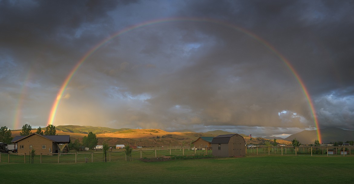 A rainbow forms over the Sanders County area on Sunday, June 30, 2024. (Tracy Scott/Valley Press)