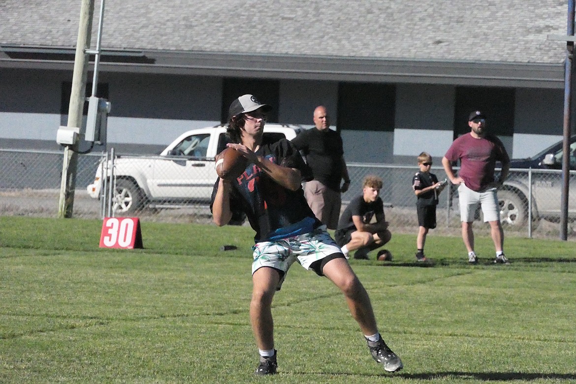 Plains quarterback Greg Tatum prepares to launch a pass downfield during the Horsemen's game versus Darby in the five-on-five Passing League tournament in Superior. (Chuck Bandel/VP-MI)