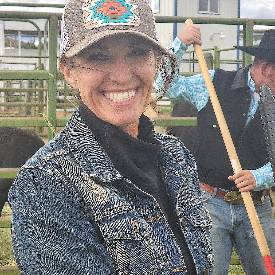 Lacie DeMers of 406 Rodeo gets broncs and bulls for the junior rodeo settled in at the Polson fairgrounds last week. (Berl Tiskus/Leader)