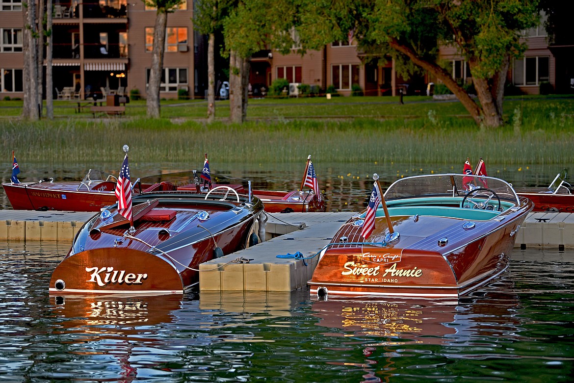 Boats named Killer and Sweet Annie in the marina at the Lodge at Whitefish Lake. (Kelsey Evans/Whitefish Pilot)