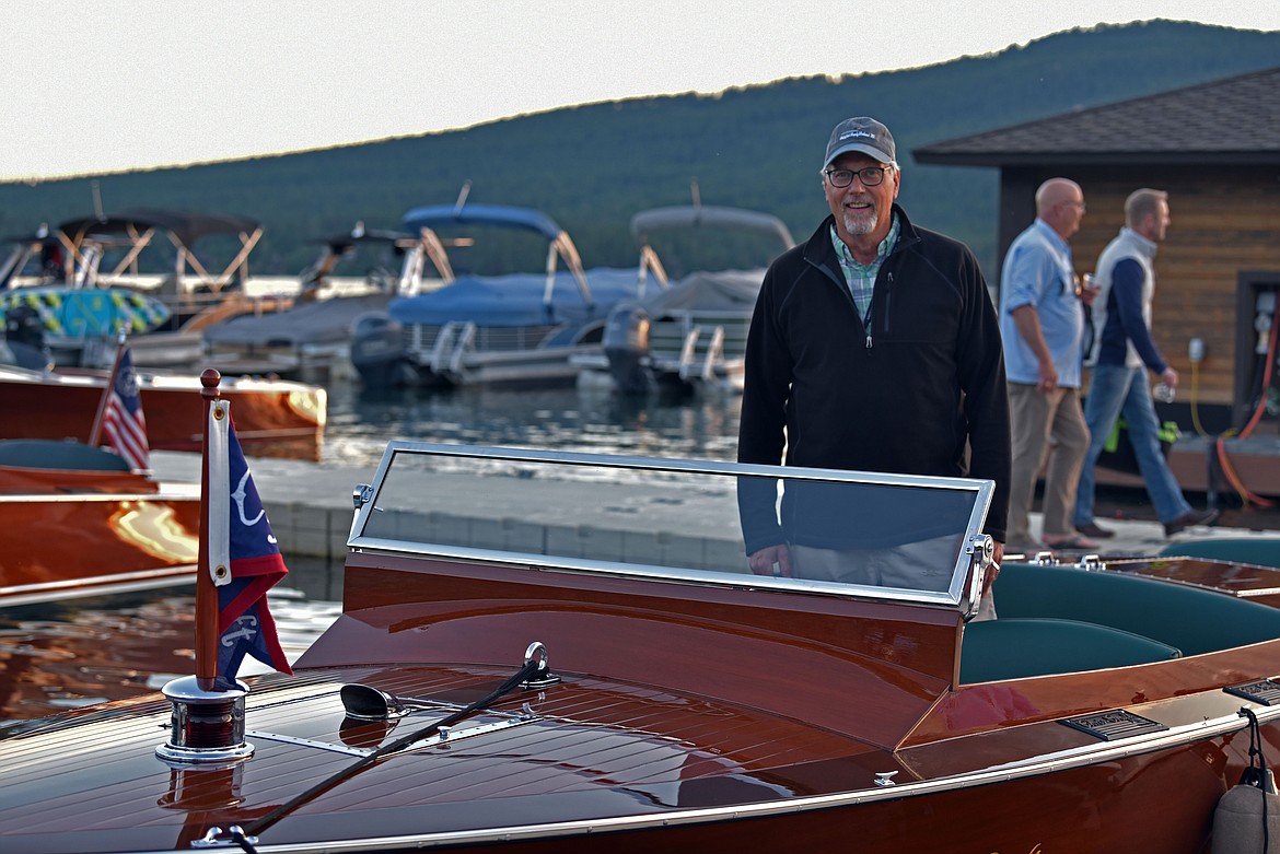 Dean Sackett (pictured) and Barb Rigg of Somers captain the oldest boat in the show by one year. HOBO is a 1929 24-foot Chris-Craft Model 3 built in Algonac, Michigan. (Kelsey Evans/Whitefish Pilot)