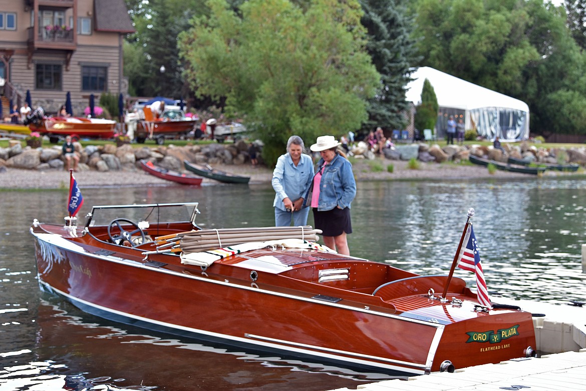 Spectators marvel at the wooden boats at Whitefish Woody Weekend on Friday. (Kelsey Evans/Whitefish Pilot)