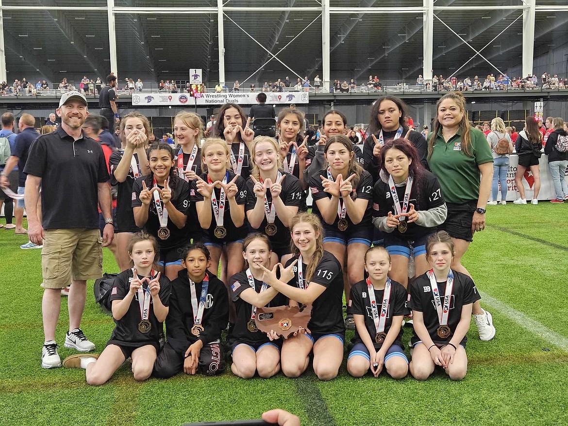 Members of the 14U Washington Girls wrestling team smile for a photo after competing at the USA Wrestling Women’s National Duals tournaments in Westfield, Indiana last month. Sophia Garza and Anahi Garcia from Moses Lake both competed in the tournament.