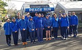 Peace torch run participates in Kalispell parade