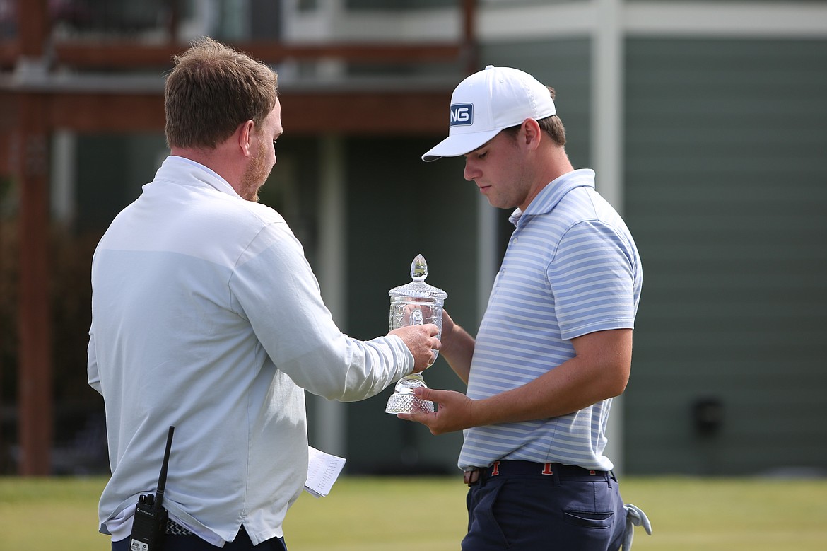Max Herendeen, from Bellvue, receives the second-place trophy at Thursday’s WA Golf Men’s Amateur Championship at The Links at Moses Pointe.