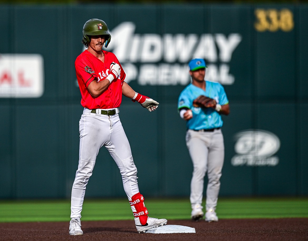 Glacier's Mason Dinesen (23) looks to the dugout after hitting a double against the Idaho Falls Chukars at Glacier Bank Park on Friday, June 14. (Casey Kreider/Daily Inter Lake)