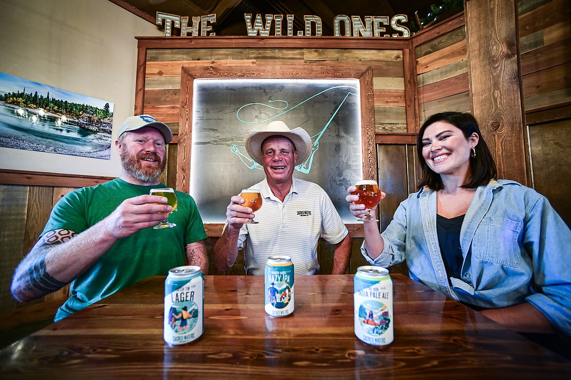 Seth Orr, Kirk Gentry and Jordan Gentry at Sacred Waters Brewing Company on Wednesday, July 3. (Casey Kreider/Daily Inter Lake)