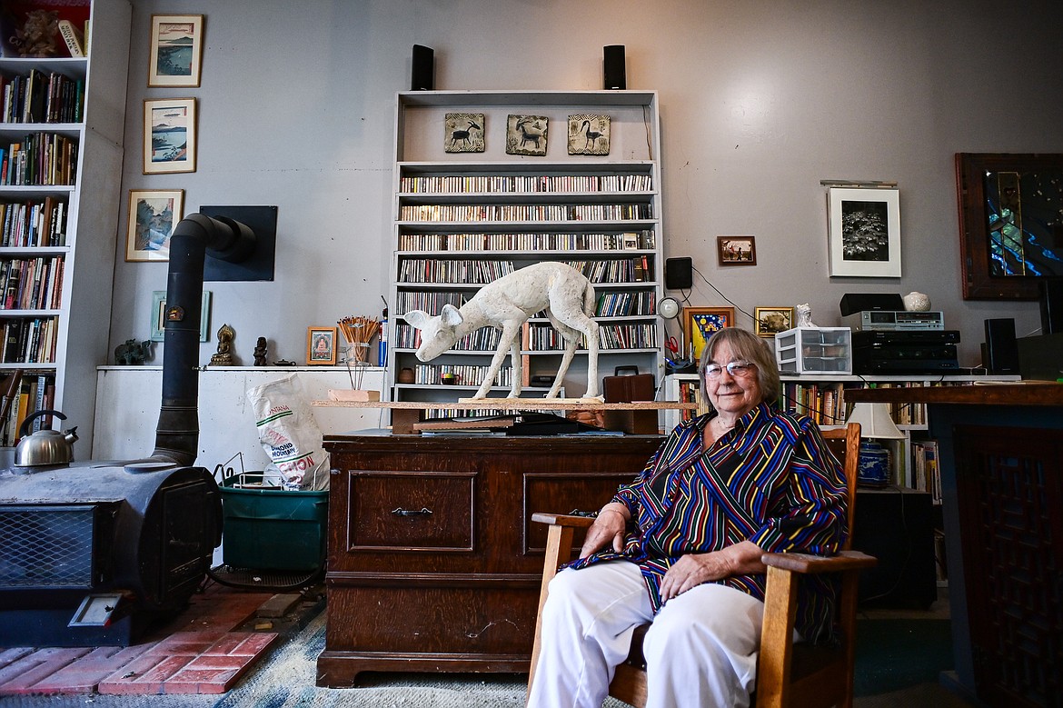 Artist Kayz Lynn with her soon-to-be-finished deer sculpture at her workshop on Wednesday, July 3. (Casey Kreider/Daily Inter Lake)