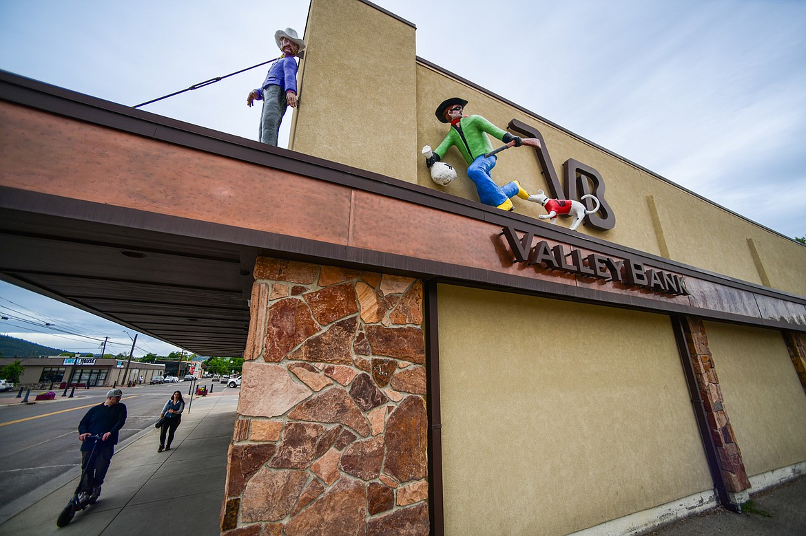 Artist Kayz Lynn's sculptures atop Valley Bank in Kalispell on Wednesday, June 26. (Casey Kreider/Daily Inter Lake)