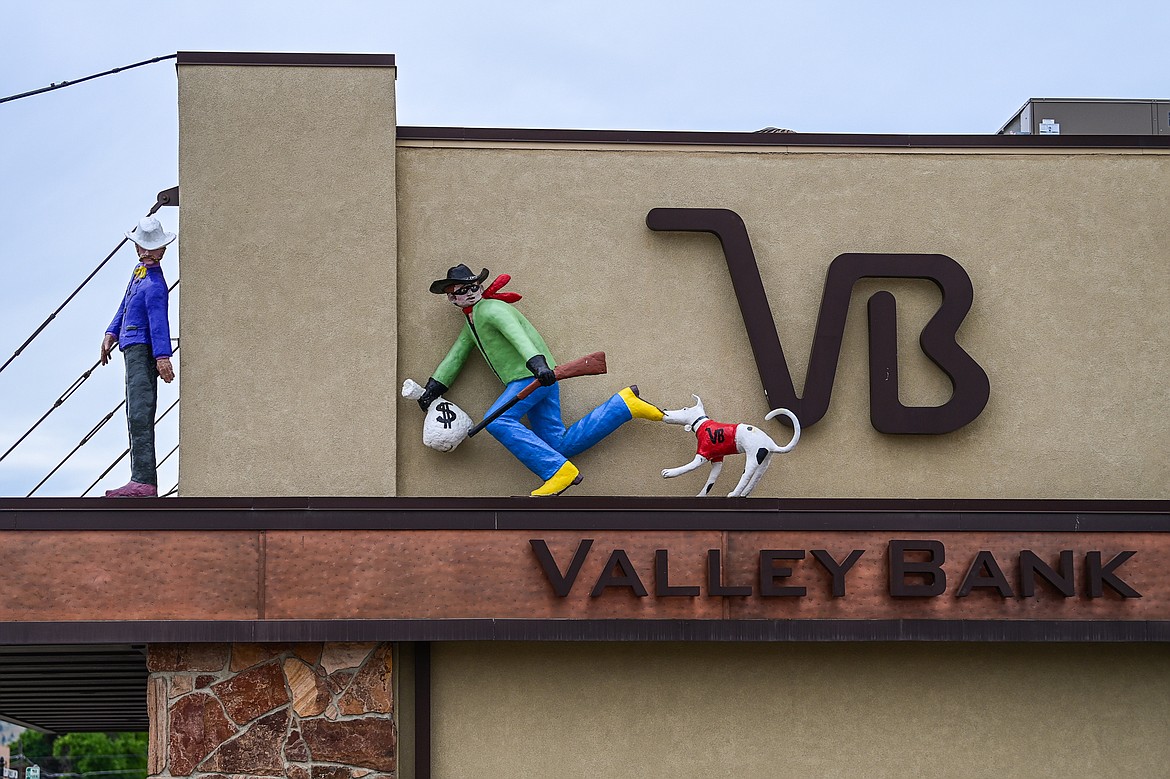 Artist Kayz Lynn's sculpture atop Valley Bank in Kalispell on Wednesday, June 26. (Casey Kreider/Daily Inter Lake)