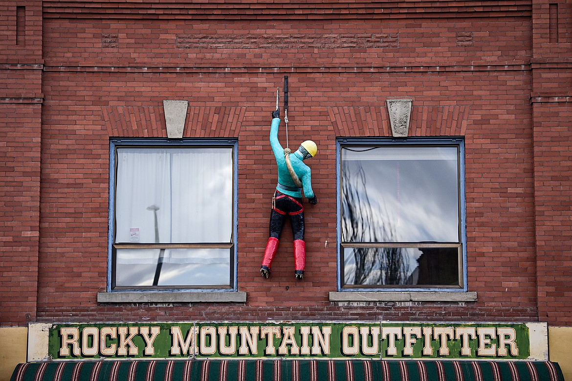 Artist Kayz Lynn's climber sculpture on Rocky Mountain Outfitter in Kalispell on Wednesday, July 3. (Casey Kreider/Daily Inter Lake)