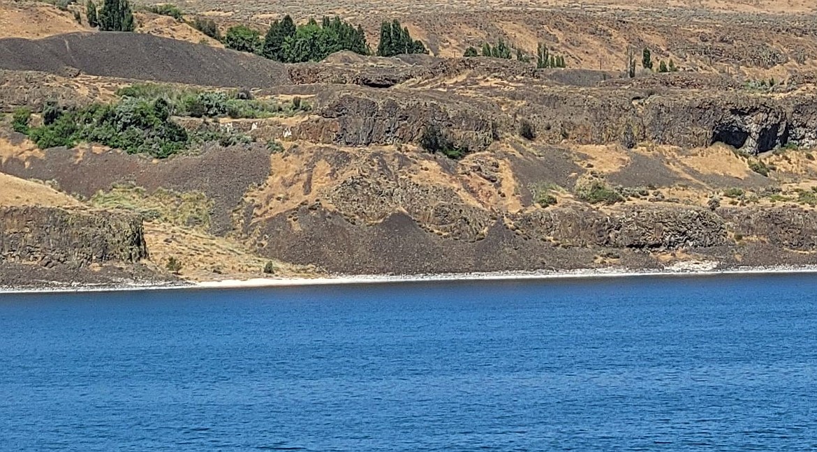 Sun shines down on Soap Lake Wednesday morning. Visiting a lake or pool might be a good idea over the next week as most days are expected to have triple-digit highs.