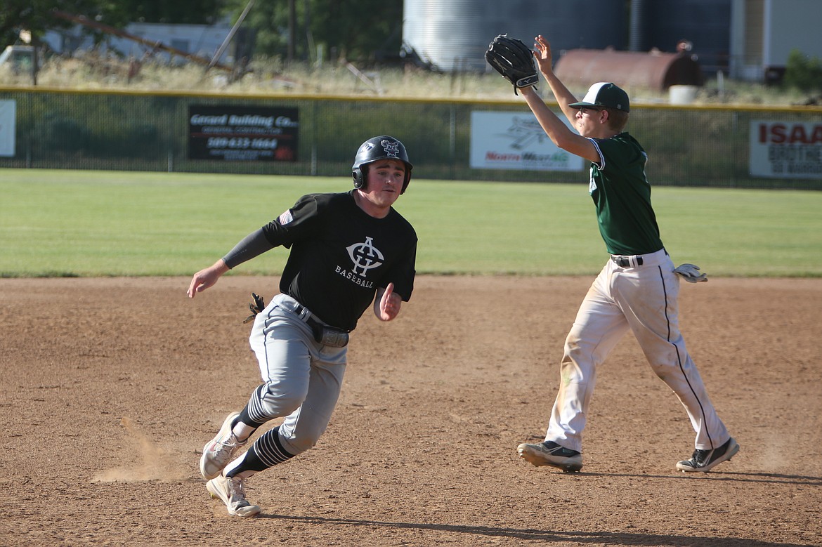 Almira/Coulee-Hartline Legion’s Carter Pitts, in black, drove in five runs during the nightcap of Tuesday’s doubleheader against Freeman.