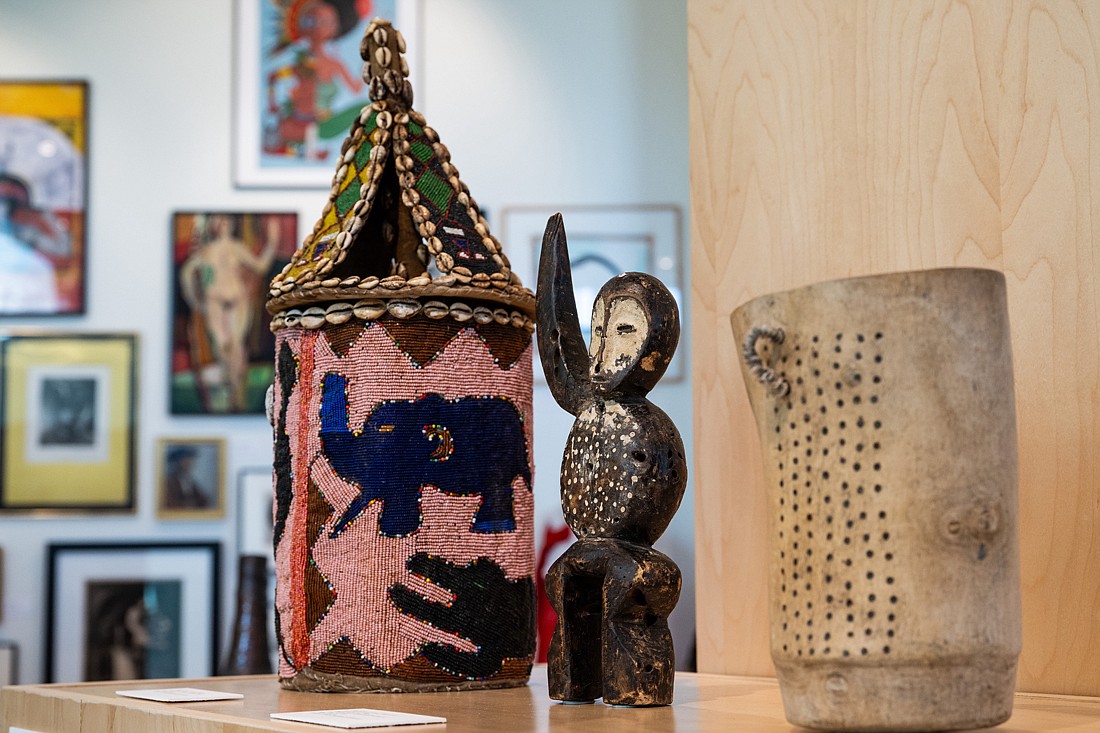 Several works from the Shepherd Collection, including a beaded head-shrine basket from Nigeria, a Congolese judgment figure with an outstretched arm, and an abstract vessel from eastern Africa crafted from wood and rope, are currently on display at the MMAC.