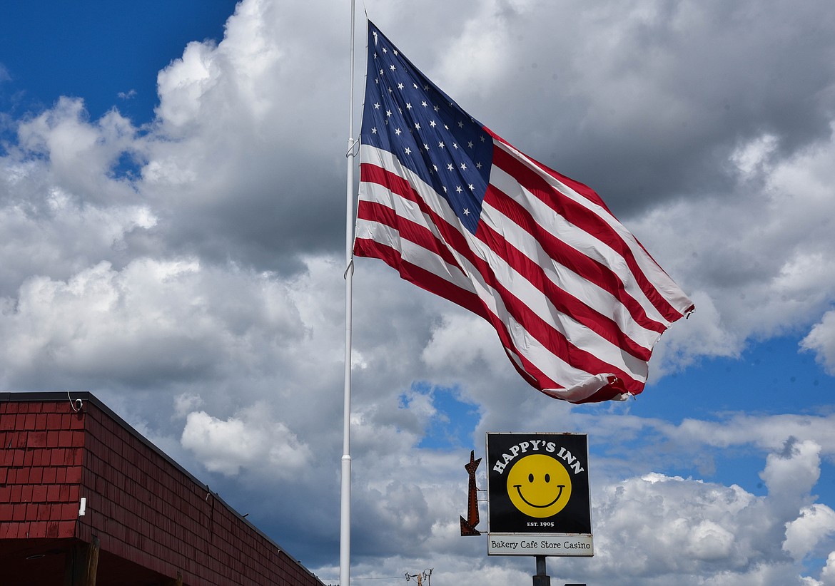 Happy's Inn, between Libby and Kalispell, boasts one of the biggest American flags in the state. (Kate Heston/Daily Inter Lake)