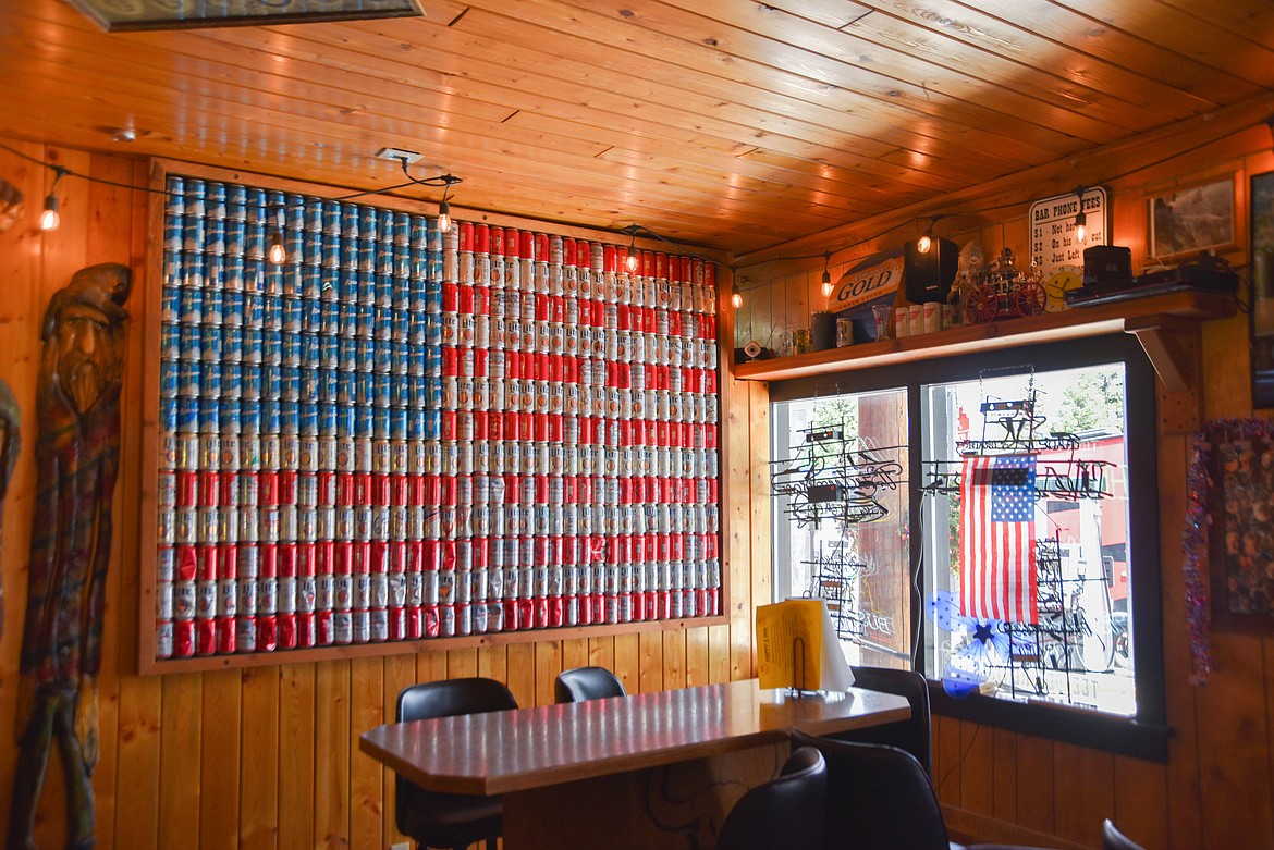 Happy's Inn, between Libby and Kalispell, has an empty beer can wall designed to look like the American flag. (Kate Heston/Daily Inter Lake)