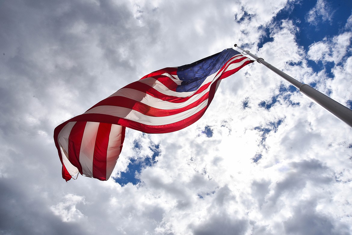 Happy's Inn, between Libby and Kalispell, boasts one of the biggest American flags in the state. (Kate Heston/Daily Inter Lake)