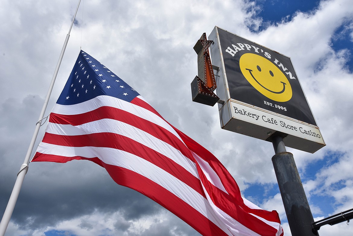 Happy's Inn, between Libby and Kalispell, boasts one of the biggest flags in the state. (Kate Heston/Daily Inter Lake)