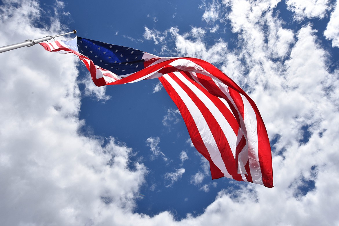 Happy's Inn, between Libby and Kalispell, boasts one of the biggest flags in the state. (Kate Heston/Daily Inter Lake)