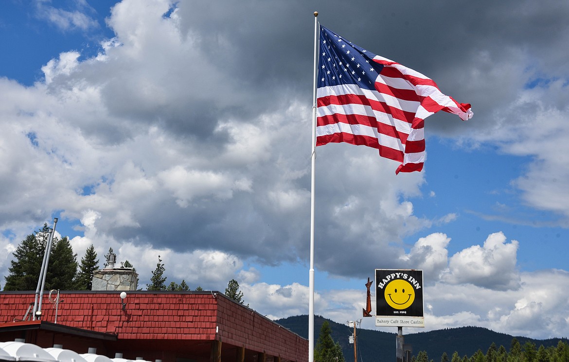 Happy's Inn, between Libby and Kalispell, boasts one of the biggest flags in the state. (Kate Heston/Daily Inter Lake)