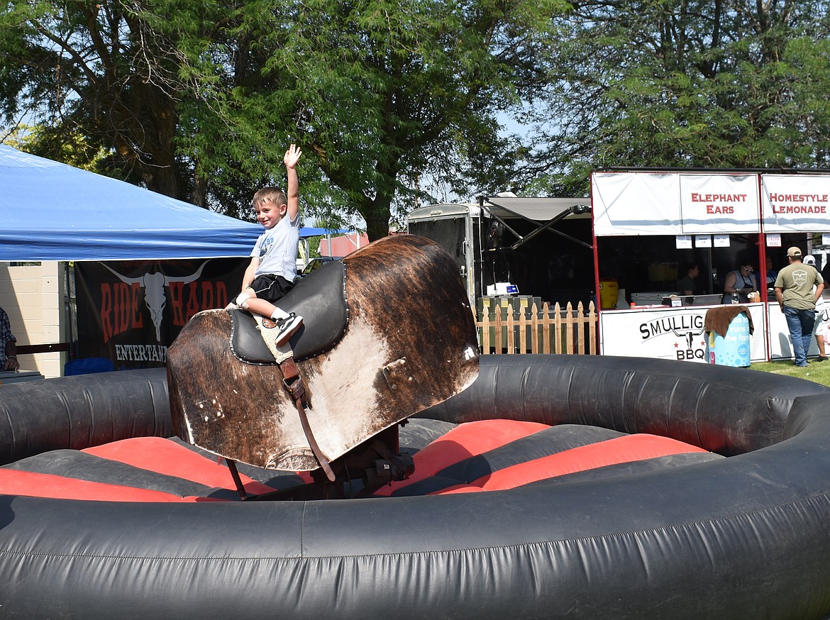 Klutch Olsen, 5, of Royal City goes for eight seconds on the mechanical bull at last year’s Summerfest. This year’s event offers even more fun stuff for the kids.