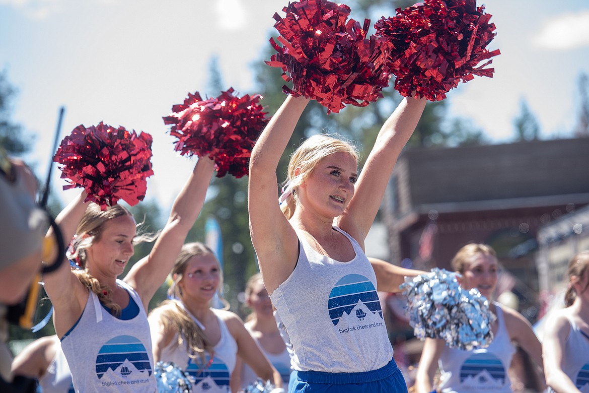 Bigfork cheerleaders perform at the Fourth of July parade on Electric Avenue Thursday. (Avery Howe/Bigfork Eagle)