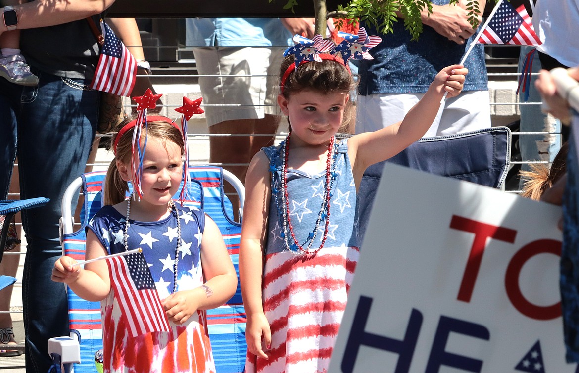 Kids watch the Fourth of July parade in Coeur d'Alene.