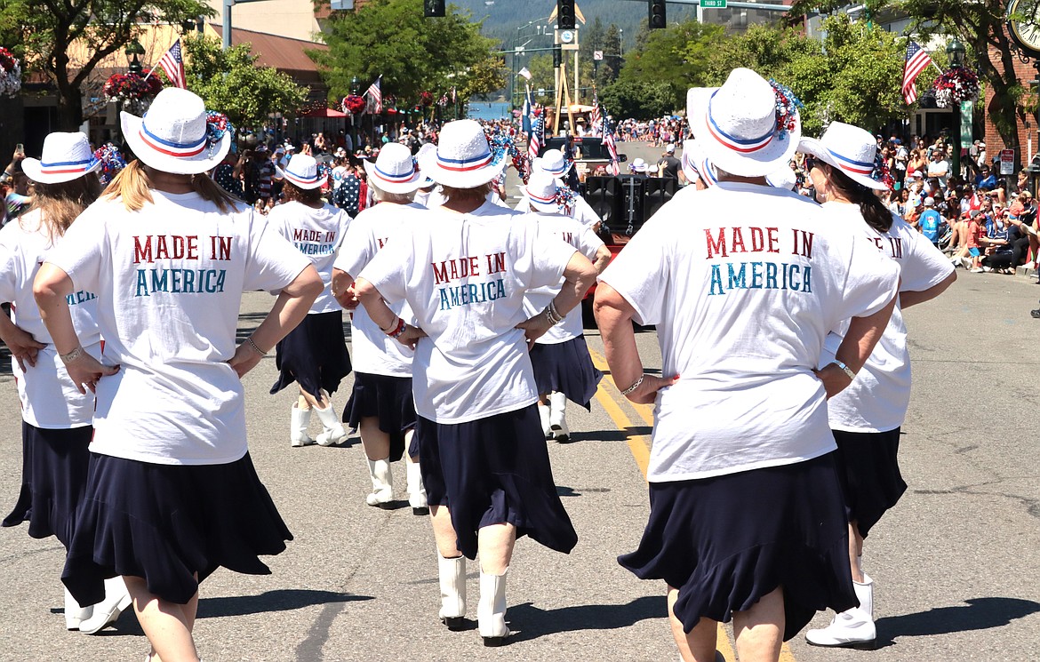 The North Idaho Sparklers wear their shirts with pride in the Fourth of July parade in Coeur d'Alene.