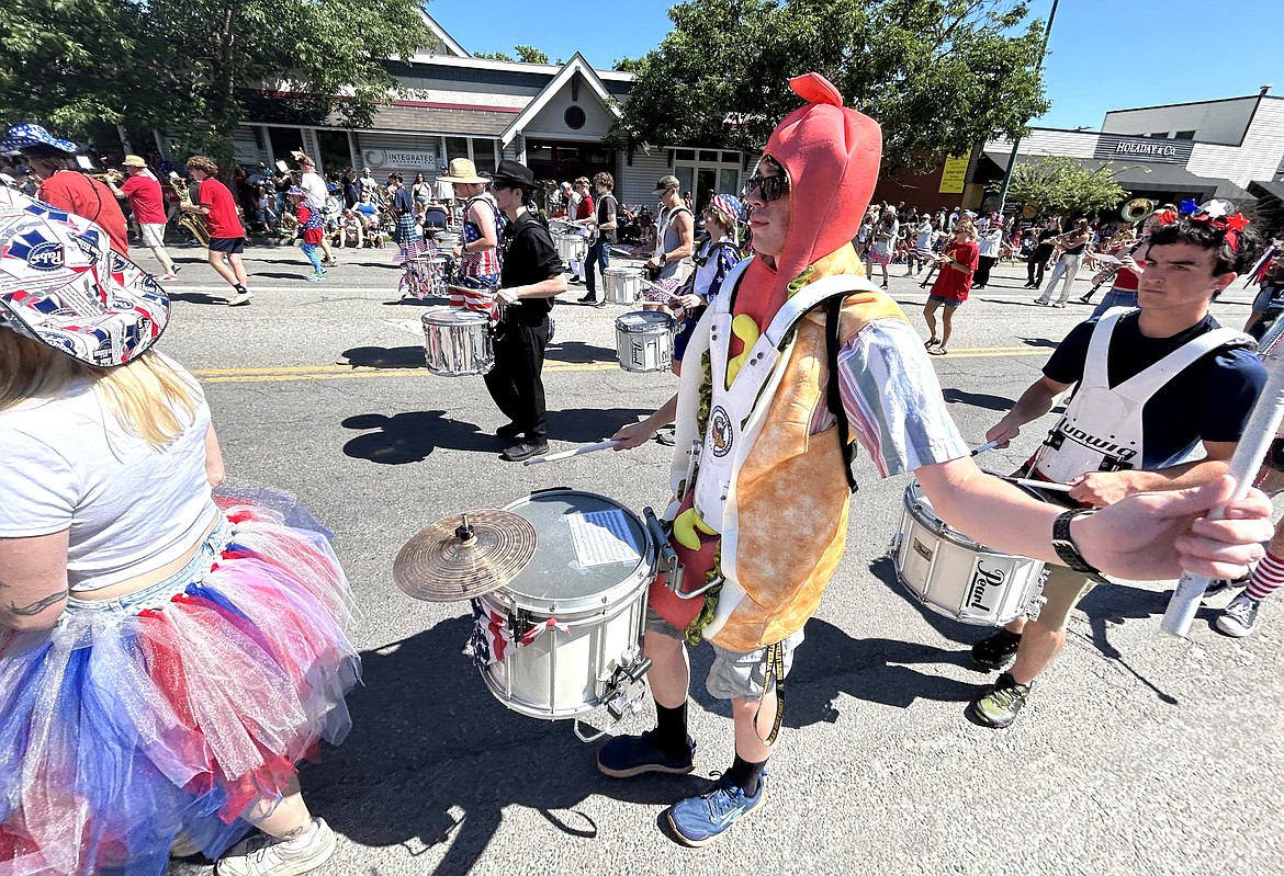 The Perfection Nots play their way through the Fourth of July parade.