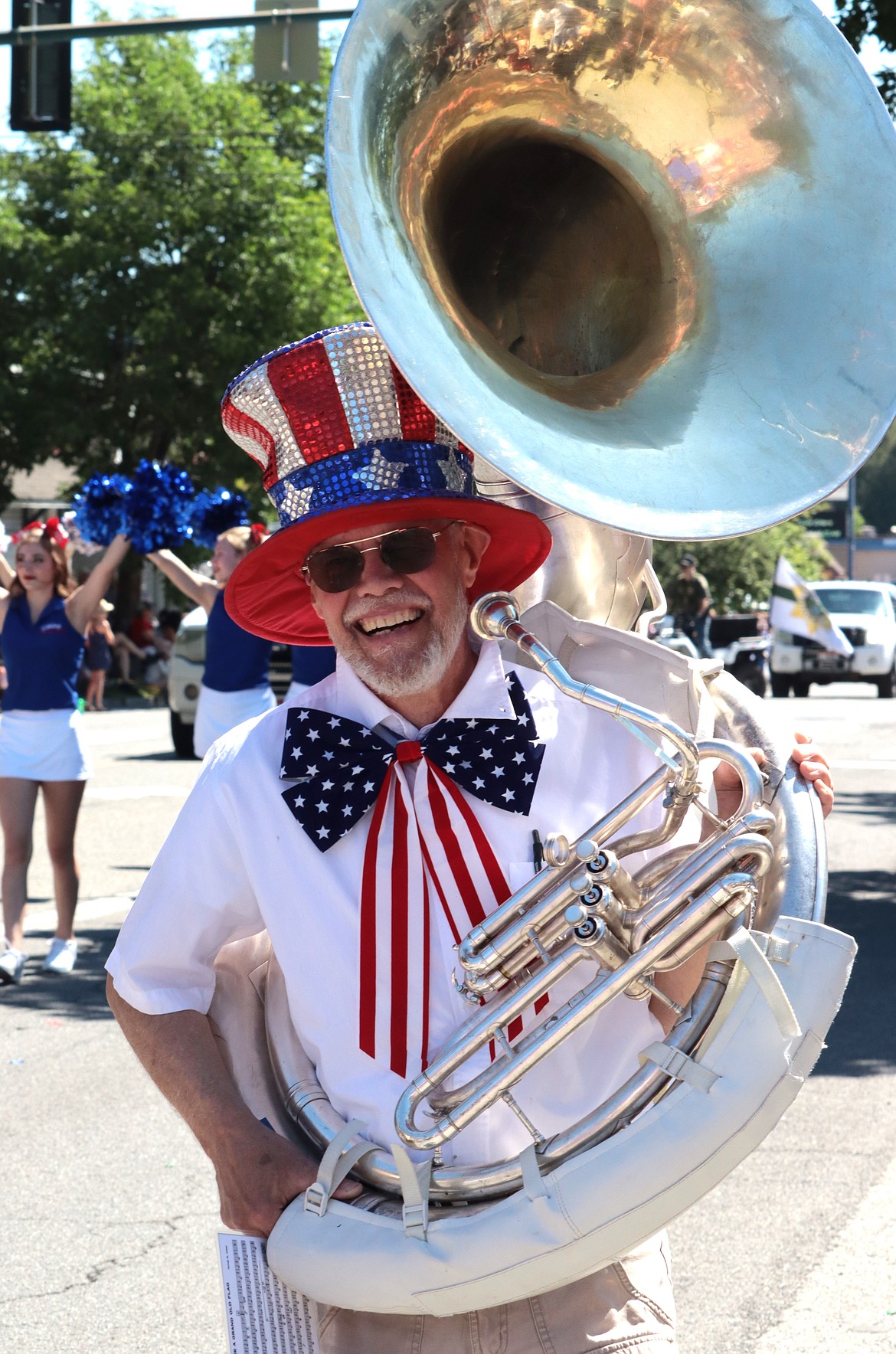 Sam Hunter laughs as he joins the Perfection Nots in the Fourth of July parade in Coeur d'Alene.