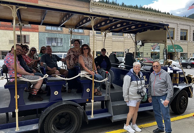 A tour group is all smiles as they return to the gift shop following their experience on the Sierra Silver Mine Tour.