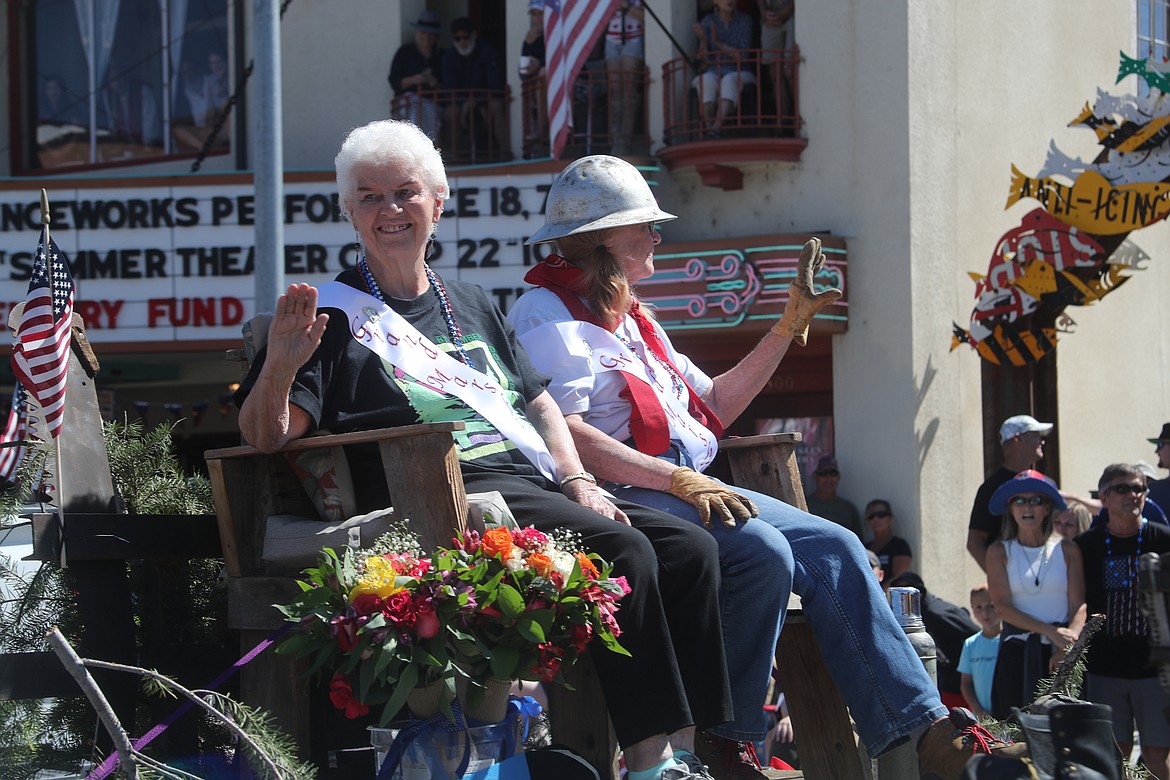 Shirley Stevens and Norma Laude, parade marshals for the Sandpoint Lions Fourth of July Grand Parade, ride on a float in the Thursday parade.