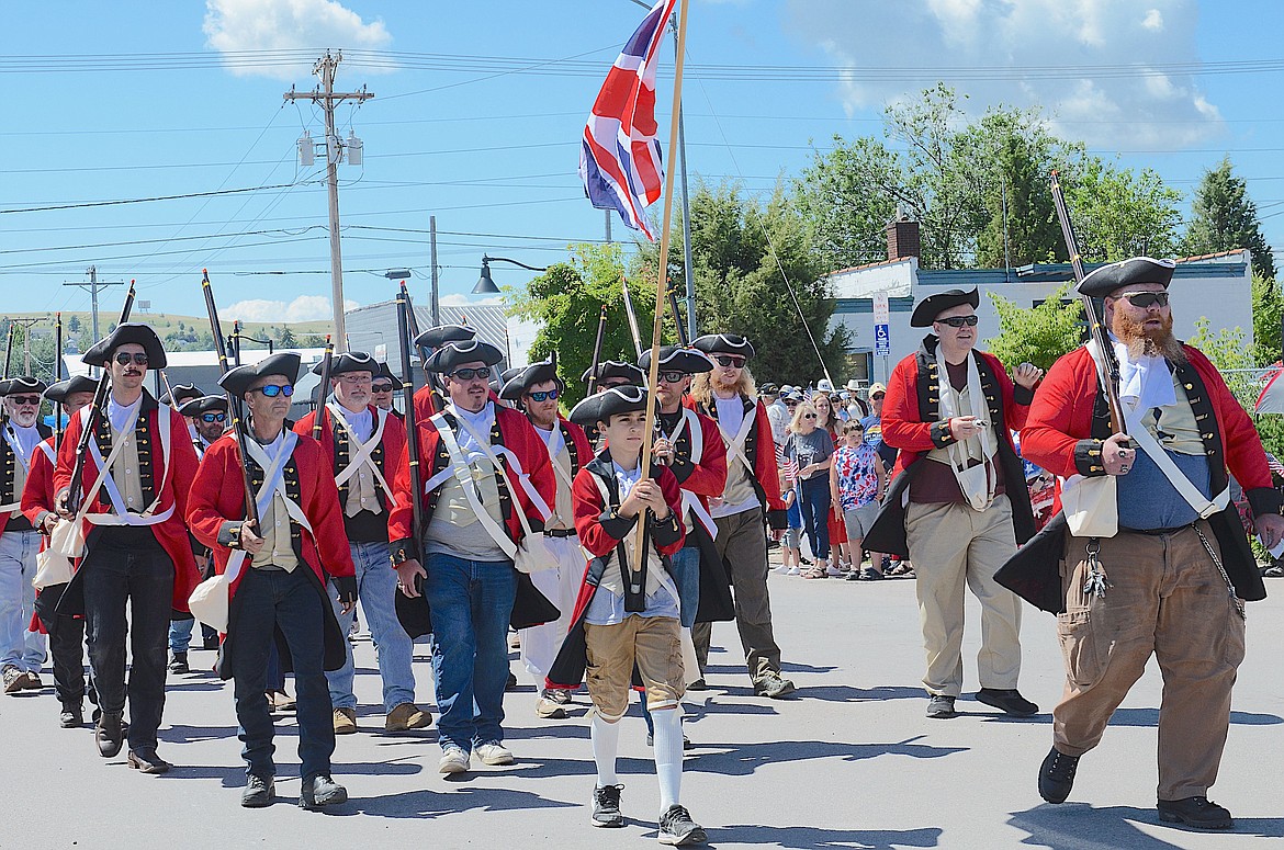 THE BRITISH ARE COMING, or at least they were Thursday, July 4, as the Red Coats marched down Main Street in Polson, preparing for a clash with the Minutemen. (Kristi Niemeyer/Leader)