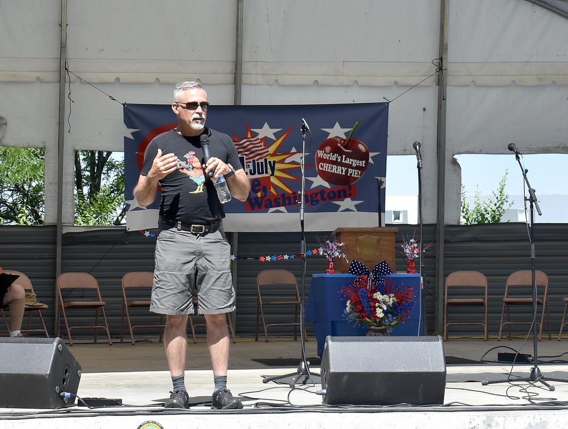 Guest speaker Chuck Holton talks about patriotism and culture at the Patriotic Observance in George Thursday.