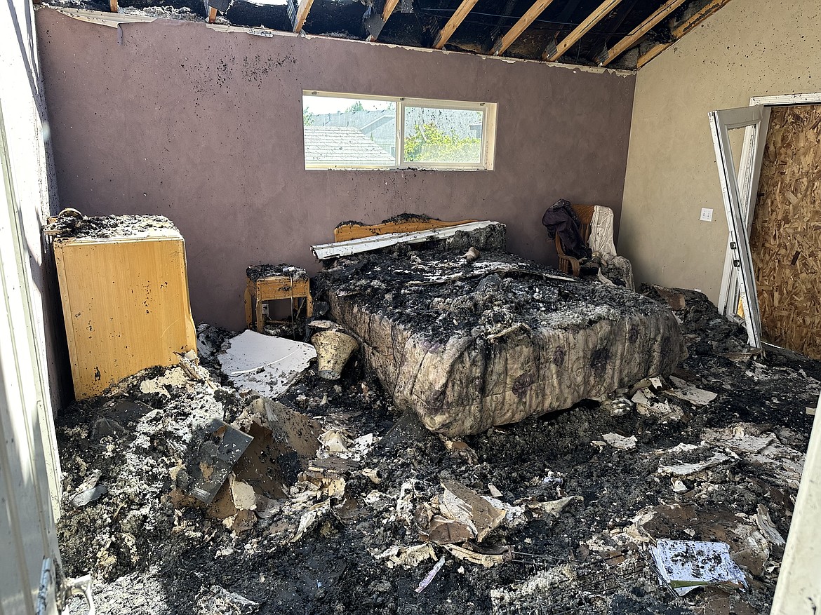 A bedroom is covered in debris after a fire in Hayden on the 2700 block of W Ashland Lane.