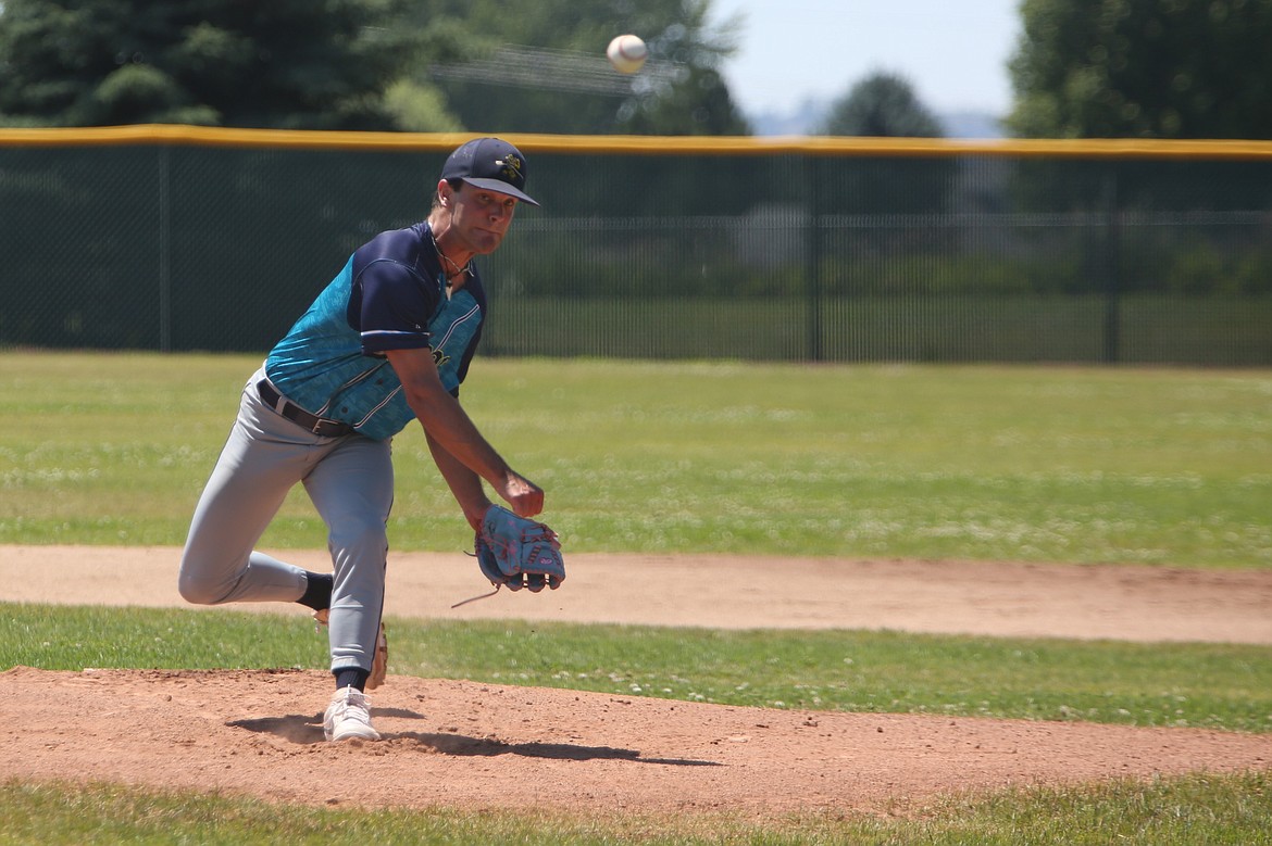 River Dog pitcher Kollin Babst unleashes a pitch against Lakeside Recovery Friday afternoon at Mt. Spokane High School in Mead.