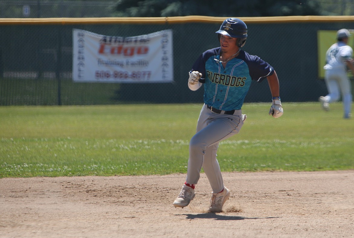 River Dog second baseman Anthony Gutierrez rounds third base before scoring in the bottom of the fourth inning against Lakeside Recovery on Friday.