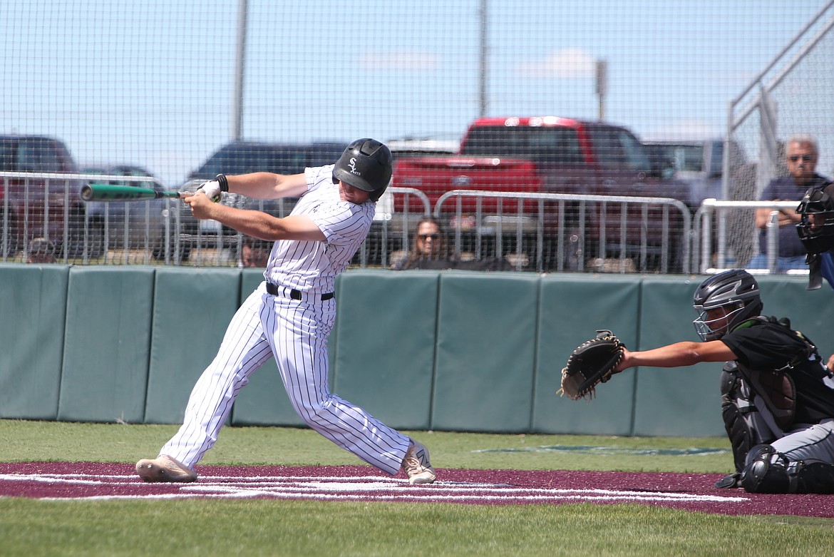 Central Washington Sixer Raiden Haynes, in white, drove in the first run of Sunday’s championship game at the Central Washington University Summer Series.