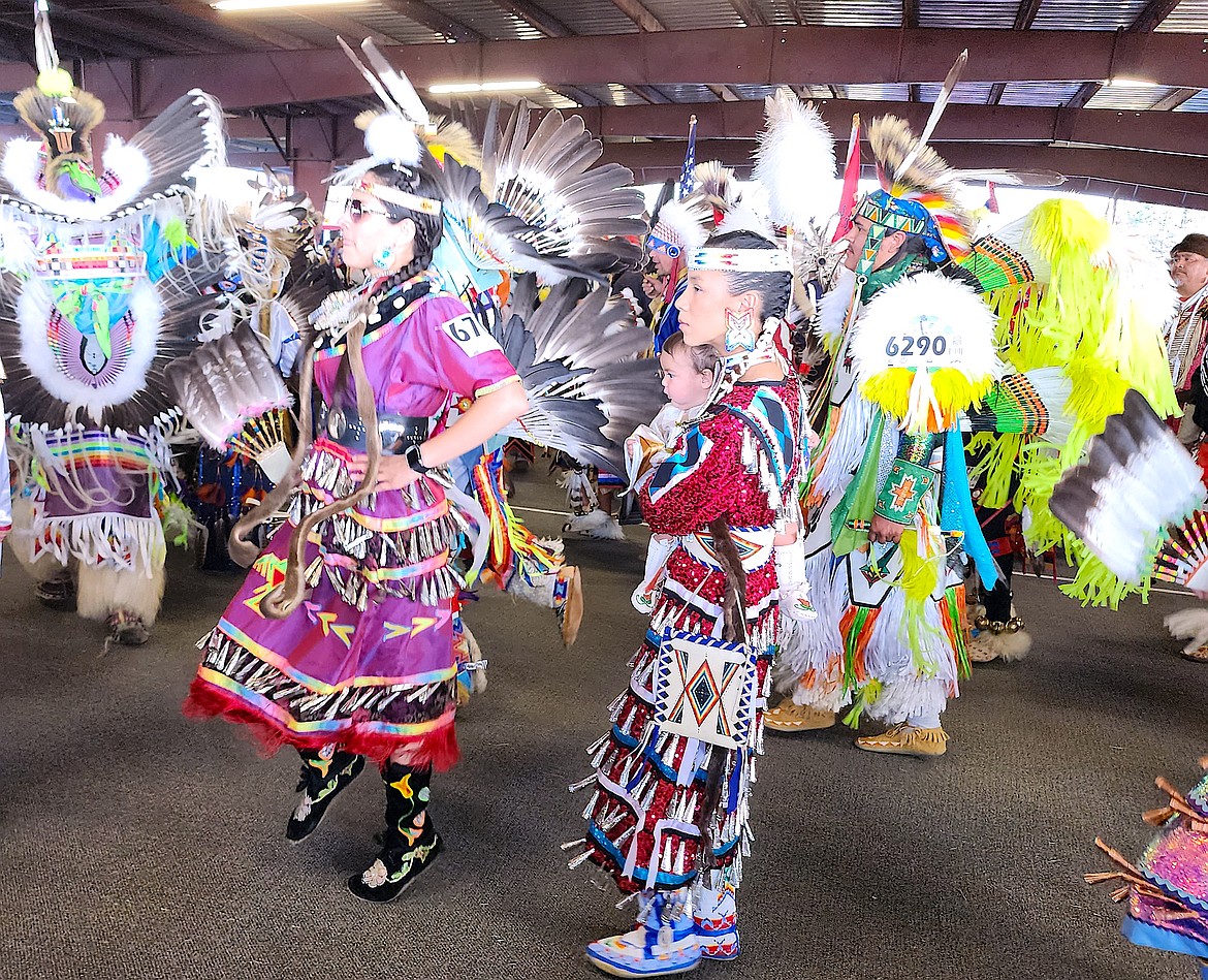 Jingle dress contestants dance in the Grand Entry. (Berl Tiskus/Leader)