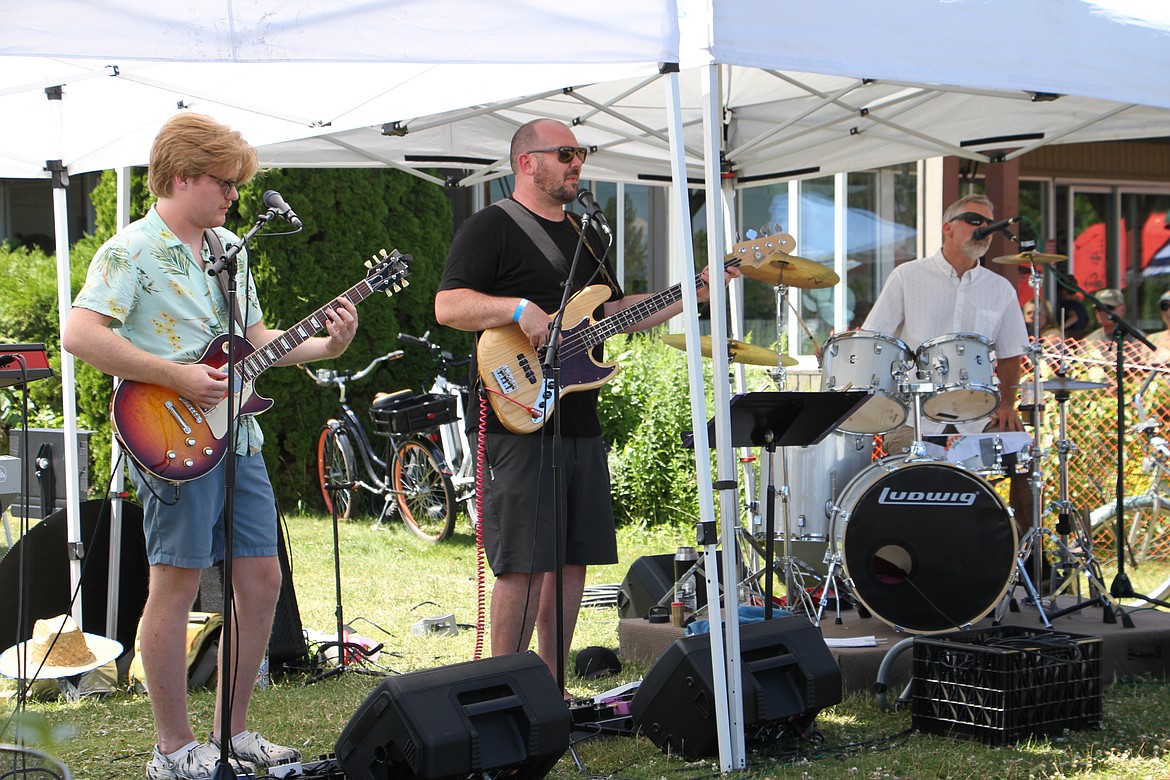 Local band RFB entertains festivalgoers.