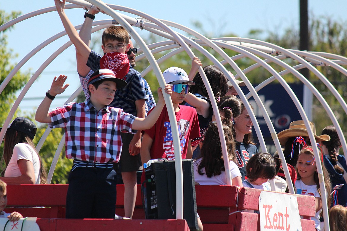 Members of the Kent family fill a float in the July 4 parade in Othello.