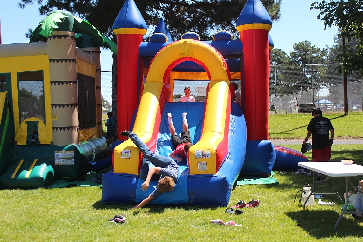 The bouncy houses in Lions Park were busy July 4 afternoon.