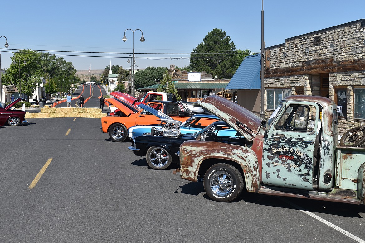 A row of classic vehicles lines Main Avenue East in Soap Lake for the annual Suds ‘N Sun celebration.