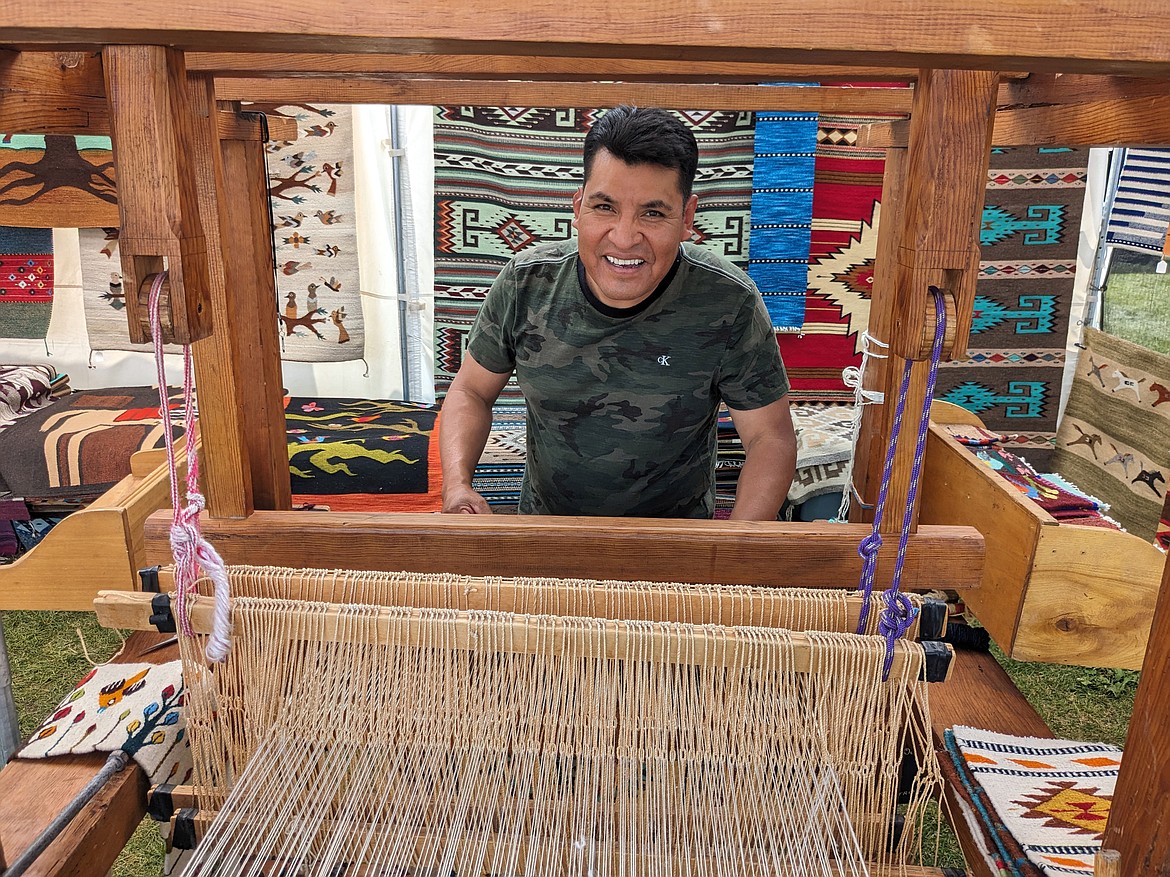 Enrique R. De Los Angeles' of Yuma, Arizona and his loom-hand spun yarn. (Kelsey Evans/Whitefish Pilot)