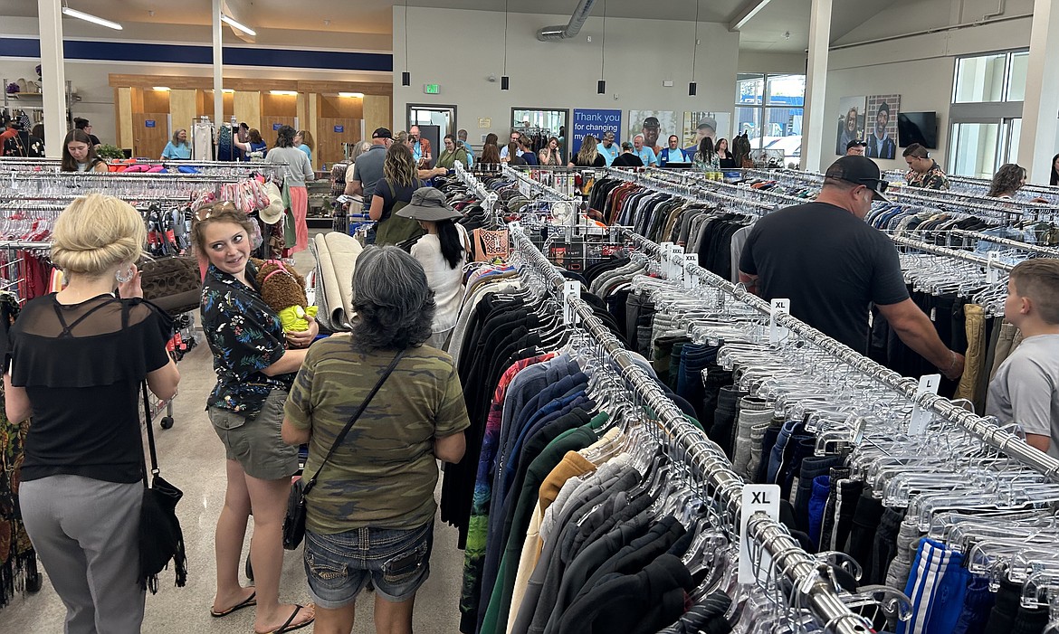 A line of shoppers waits to reach the cash registers at Goodwill on Monday.