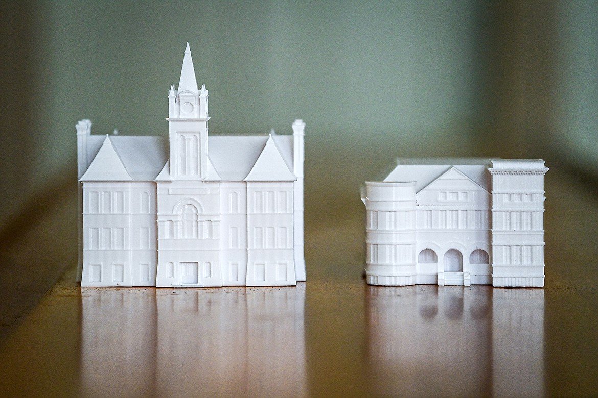 Brec Gibson's two 3D-printed, HO scale replicas of the historic Flathead County Courthouse building and Central School at the Northwest Montana History Museum on Tuesday, July 9. (Casey Kreider/Daily Inter Lake)